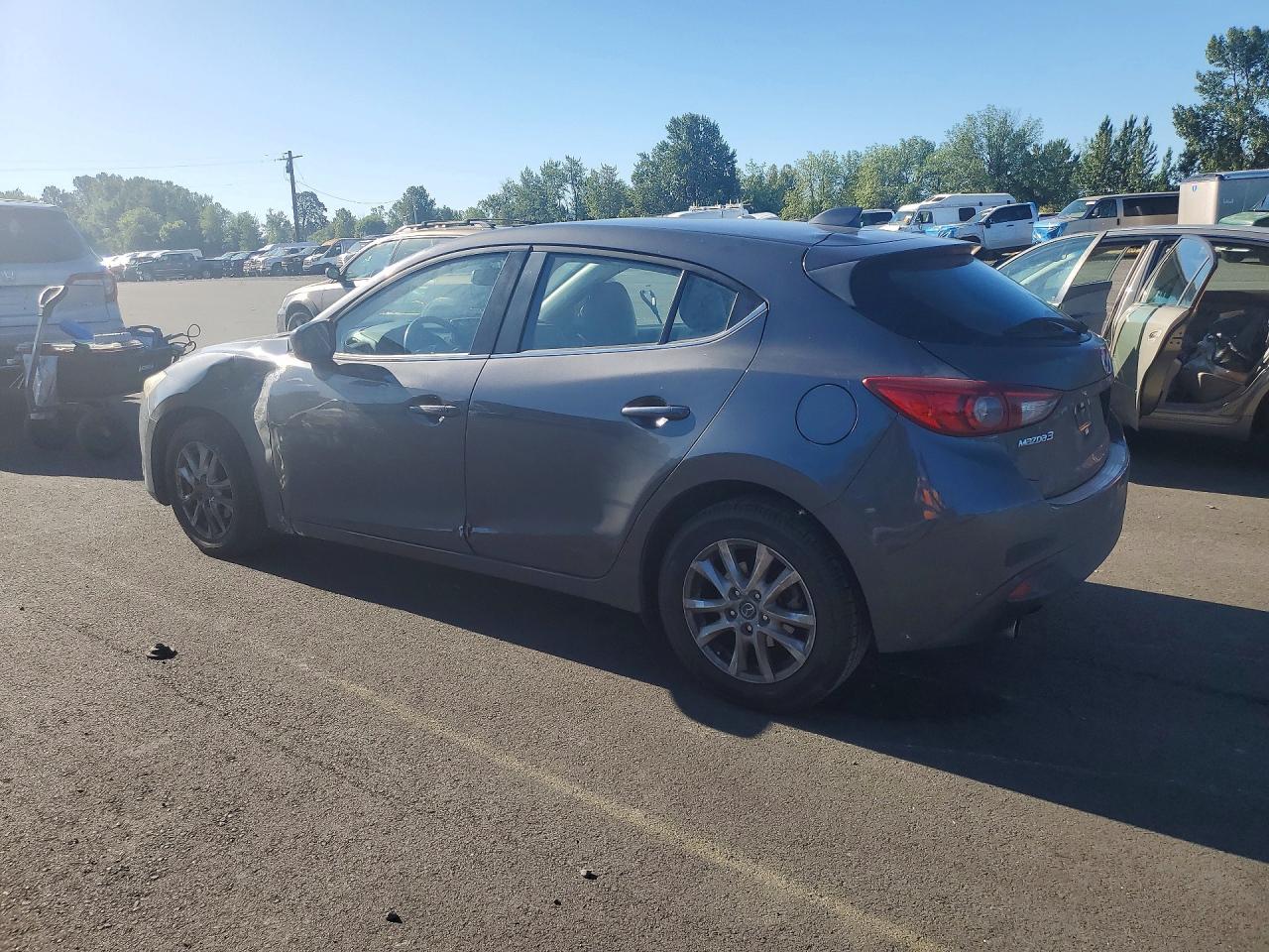 2014 Mazda 3 Grand Touring - Image 2