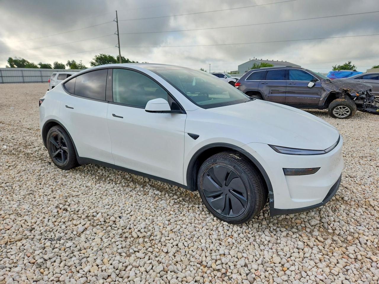 2026 Tesla Model Y - Фото 4