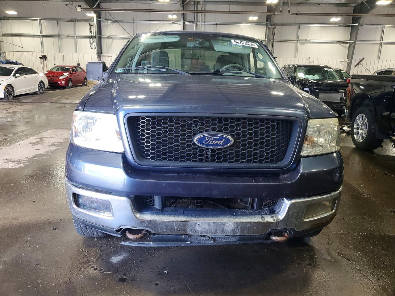 2004 Ford F150 - Фото 5