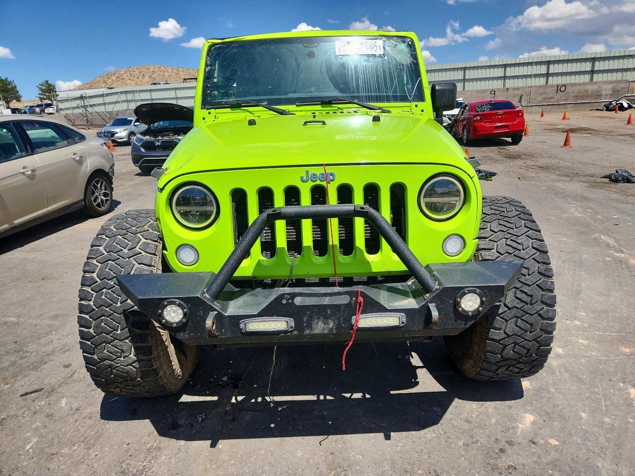 2012 Jeep Wrangler Unlimited Rubicon - Фото 5
