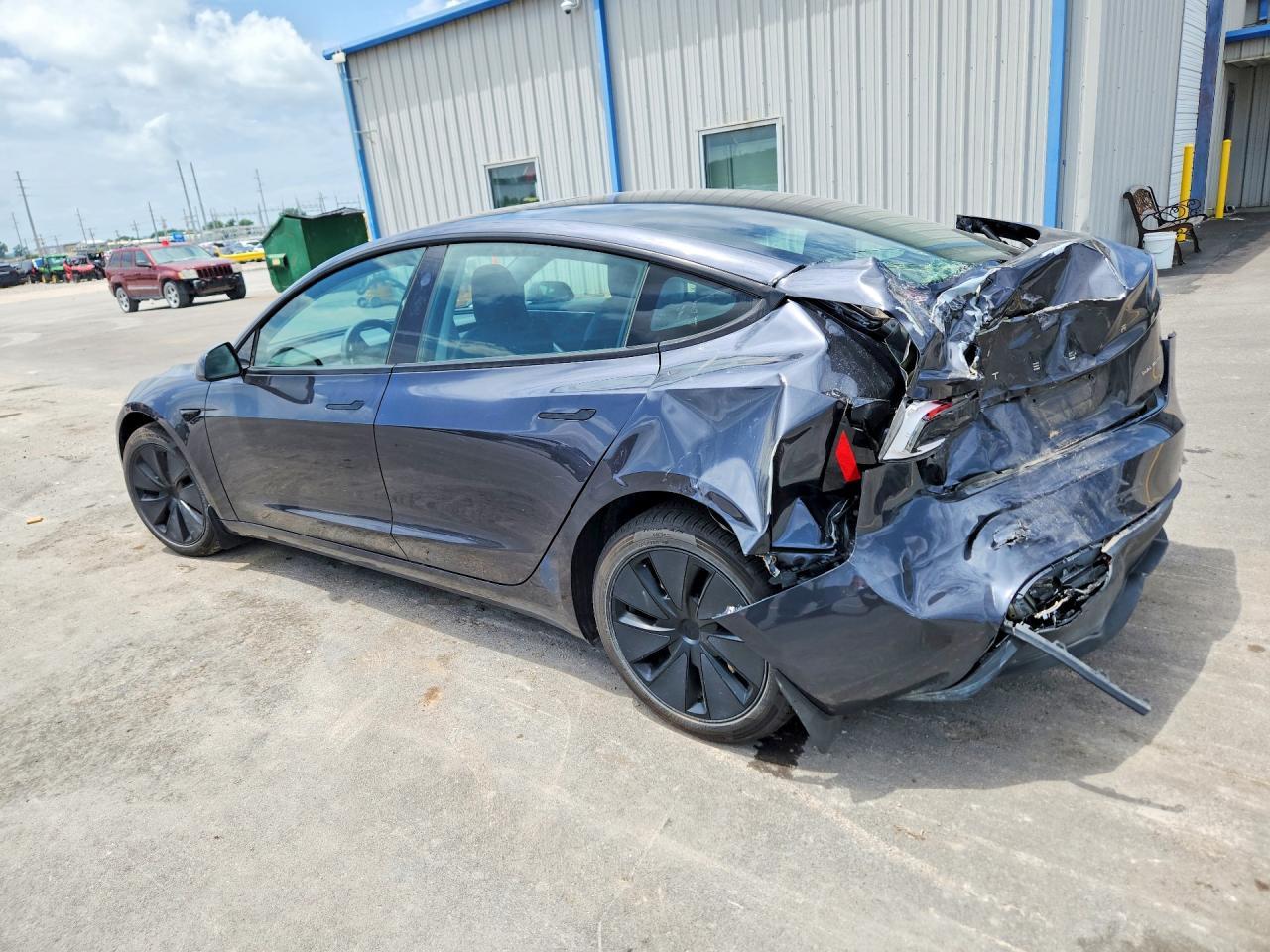 2024 Tesla Model 3 - Фото 2