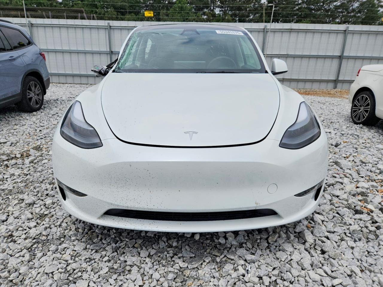 2025 Tesla Model Y - Фото 5