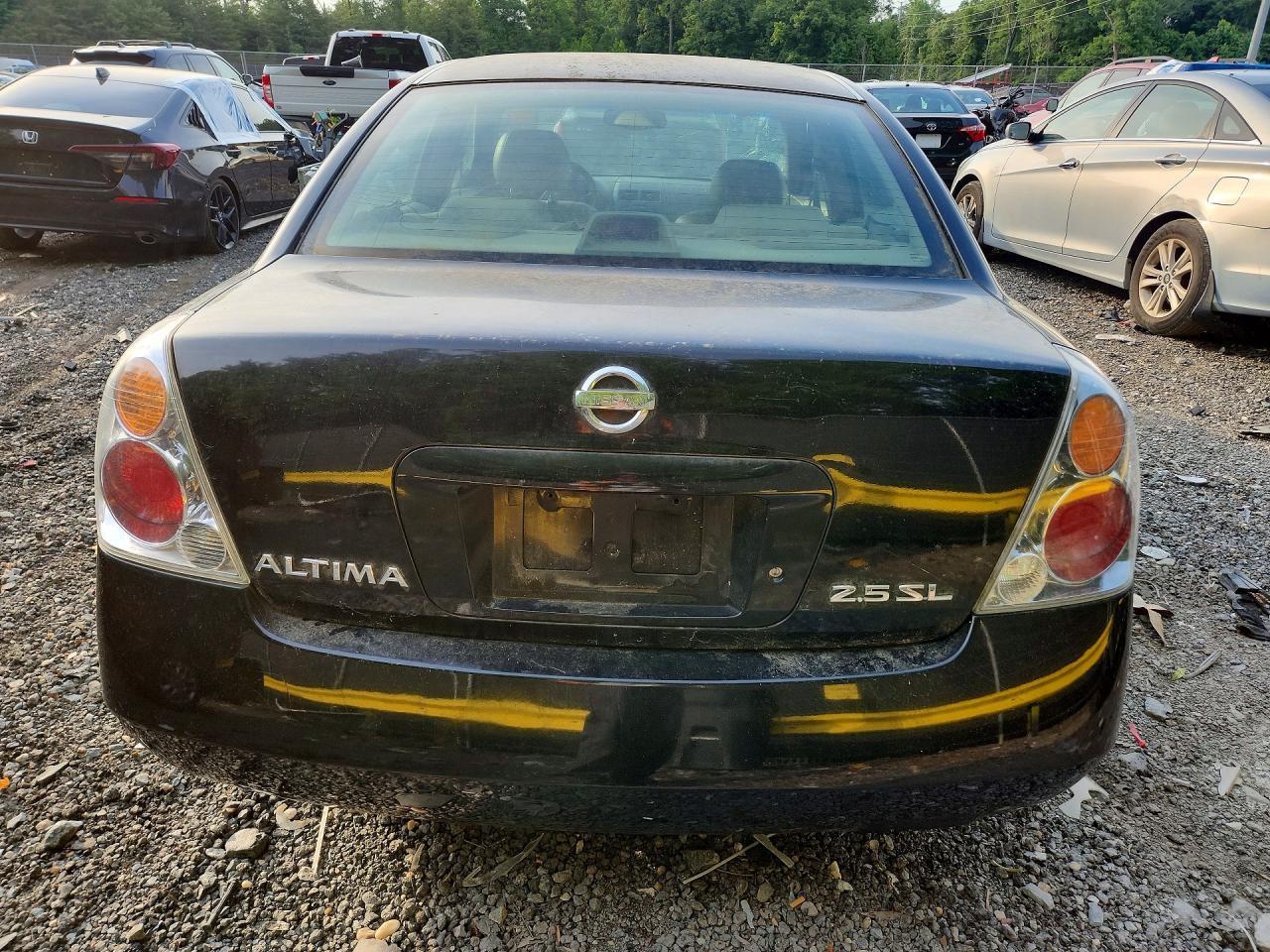 2002 Nissan Altima 2.5 - Фото 6