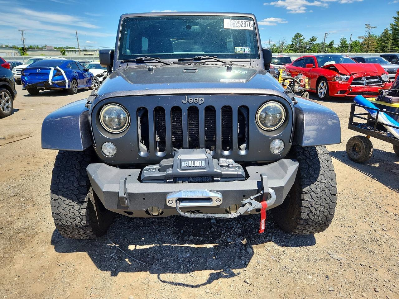 2014 Jeep Wrangler Unlimited Sahara - Фото 5