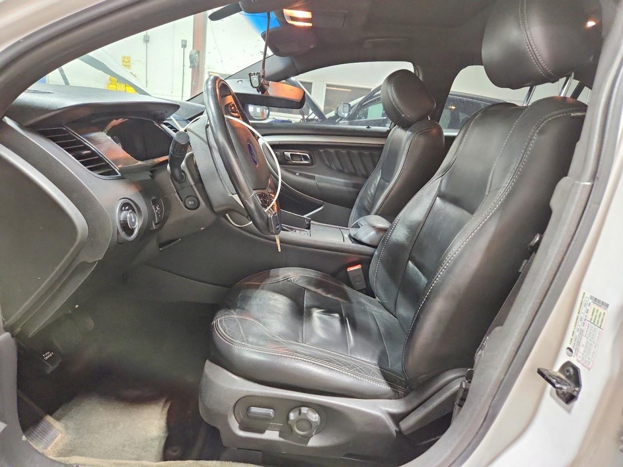 2014 Ford Taurus 4D - Фото 7