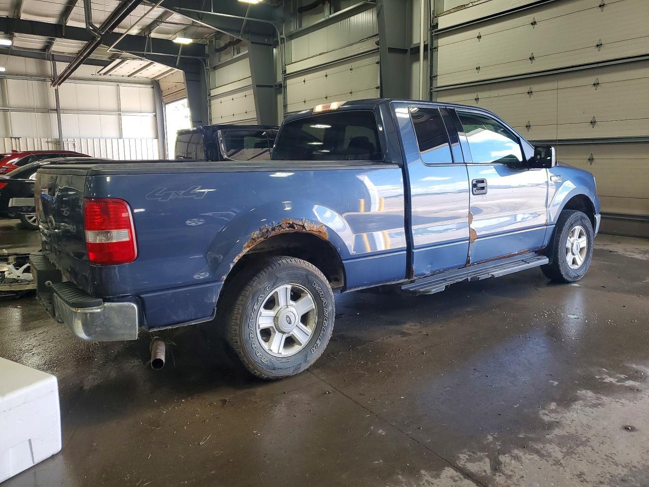 2004 Ford F150 - Фото 3
