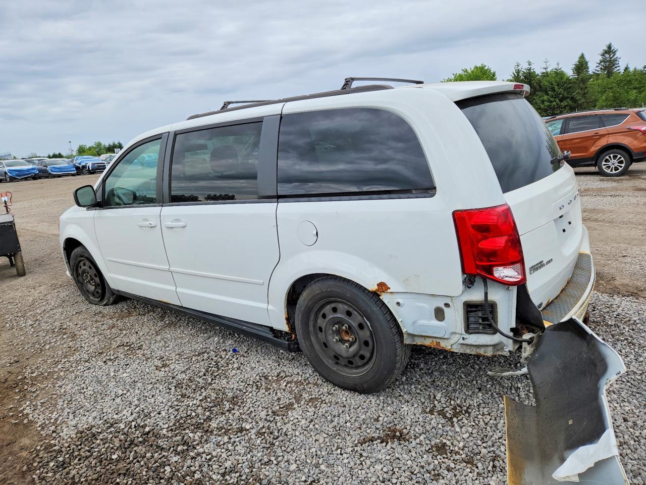2014 Dodge Caravan - Фото 2