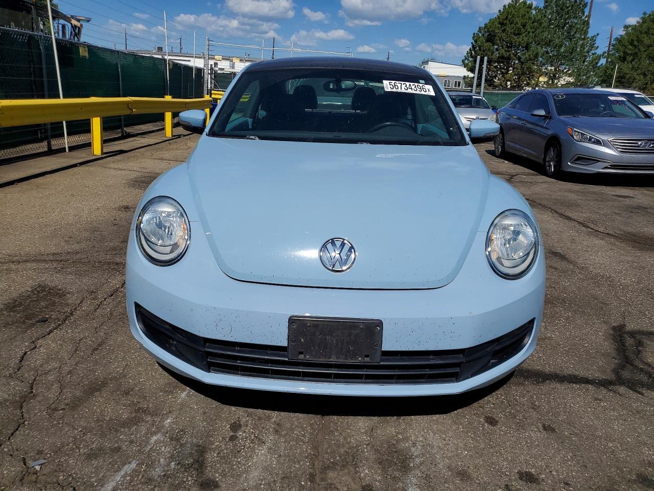 2015 Volkswagen Beetle 1.8T - Фото 5