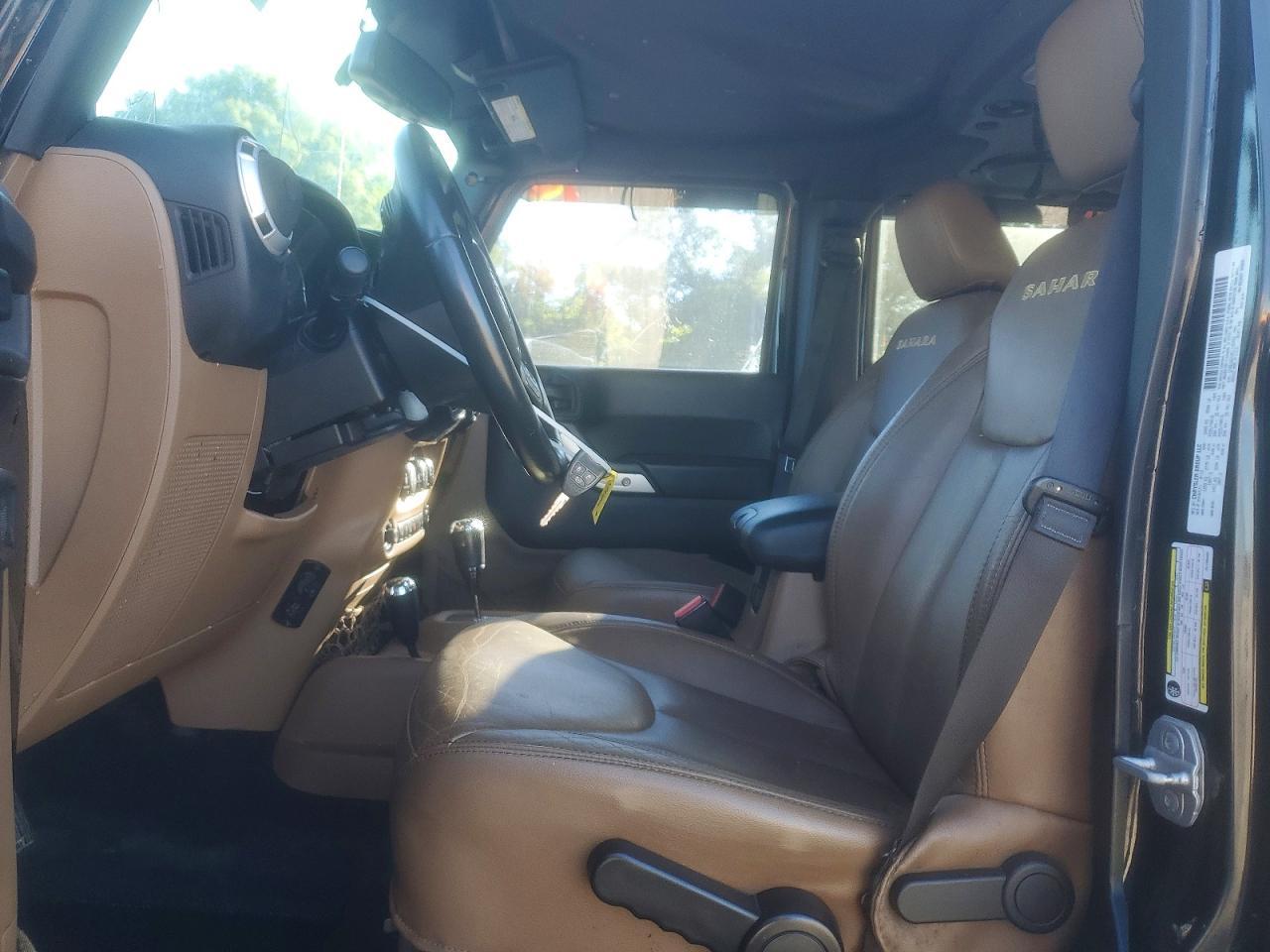 2014 Jeep Wrangler Unlimited Sahara - Фото 7
