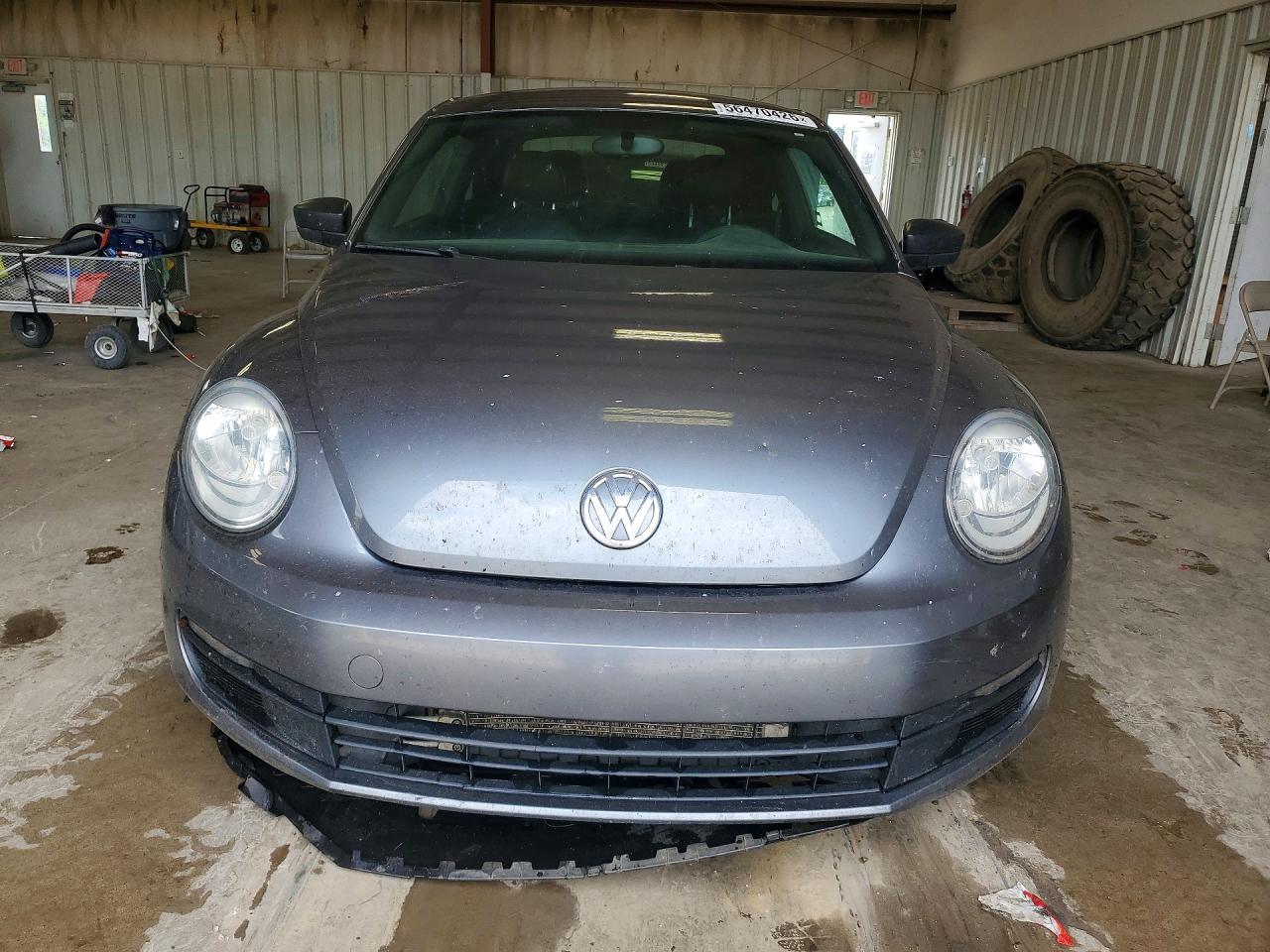 2016 Volkswagen Beetle 1.8T - Фото 5