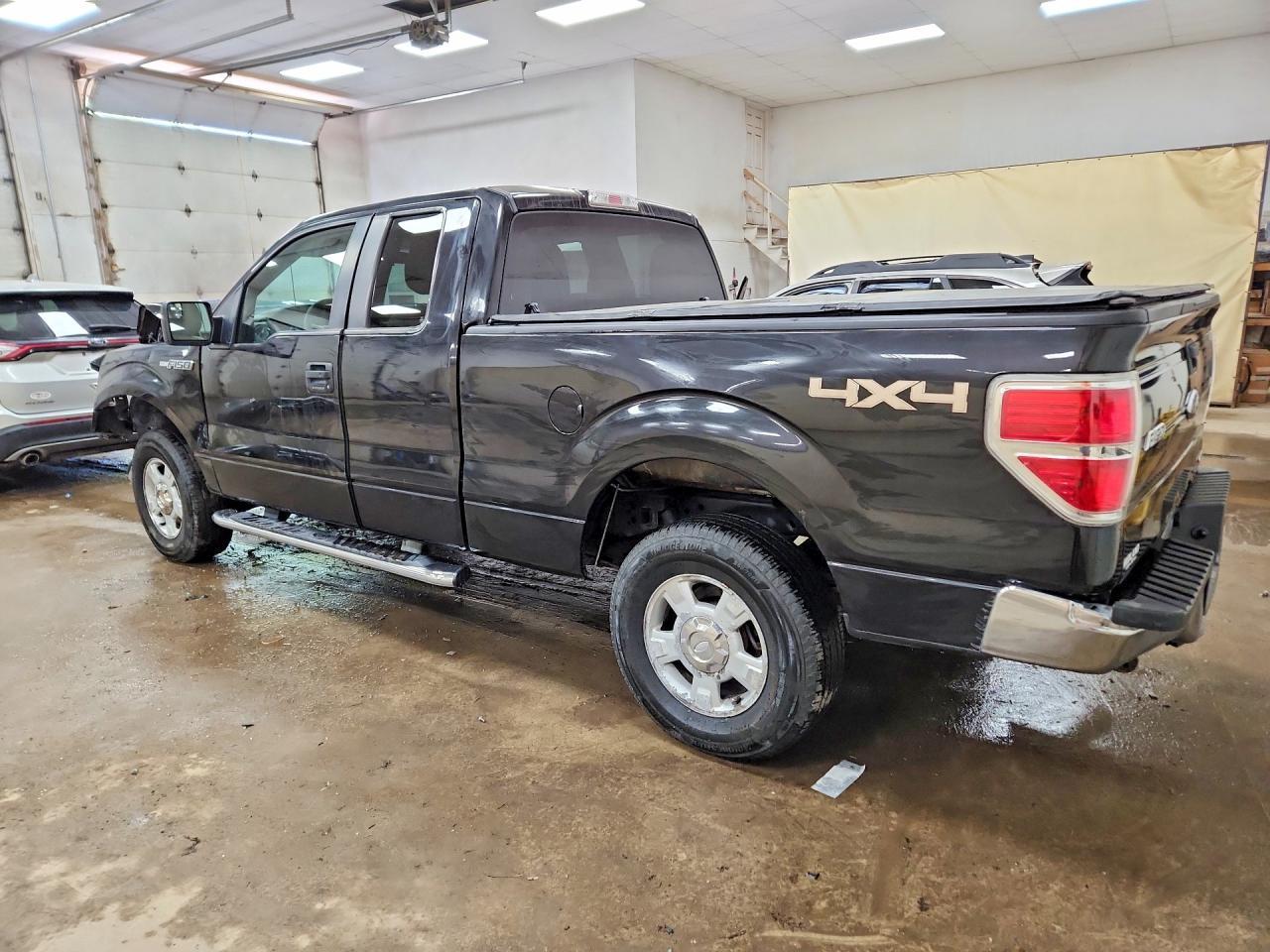 2012 Ford F150 Super Cab - Фото 2