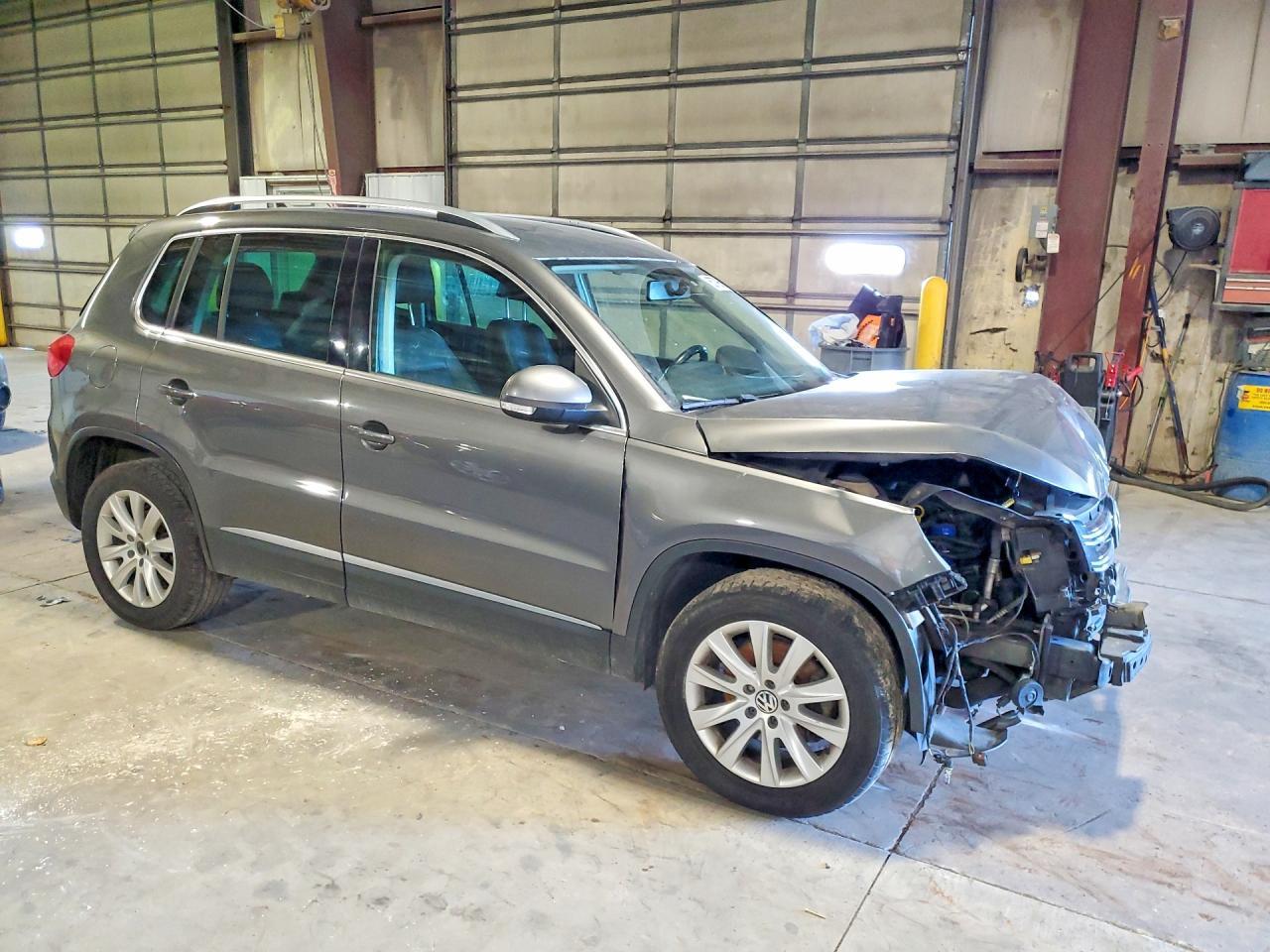 2014 Volkswagen Tiguan S - Фото 4