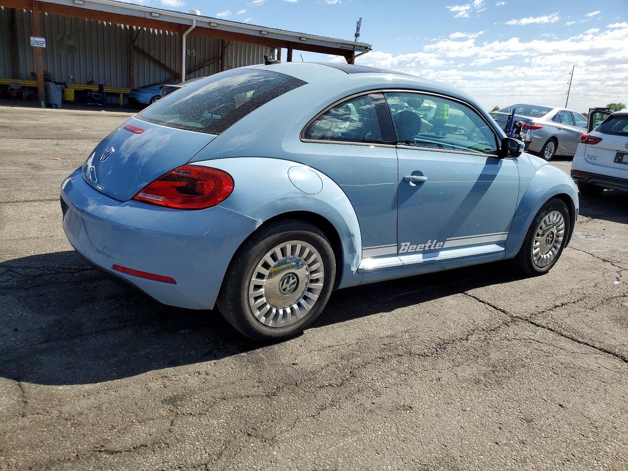 2015 Volkswagen Beetle 1.8T - Фото 3