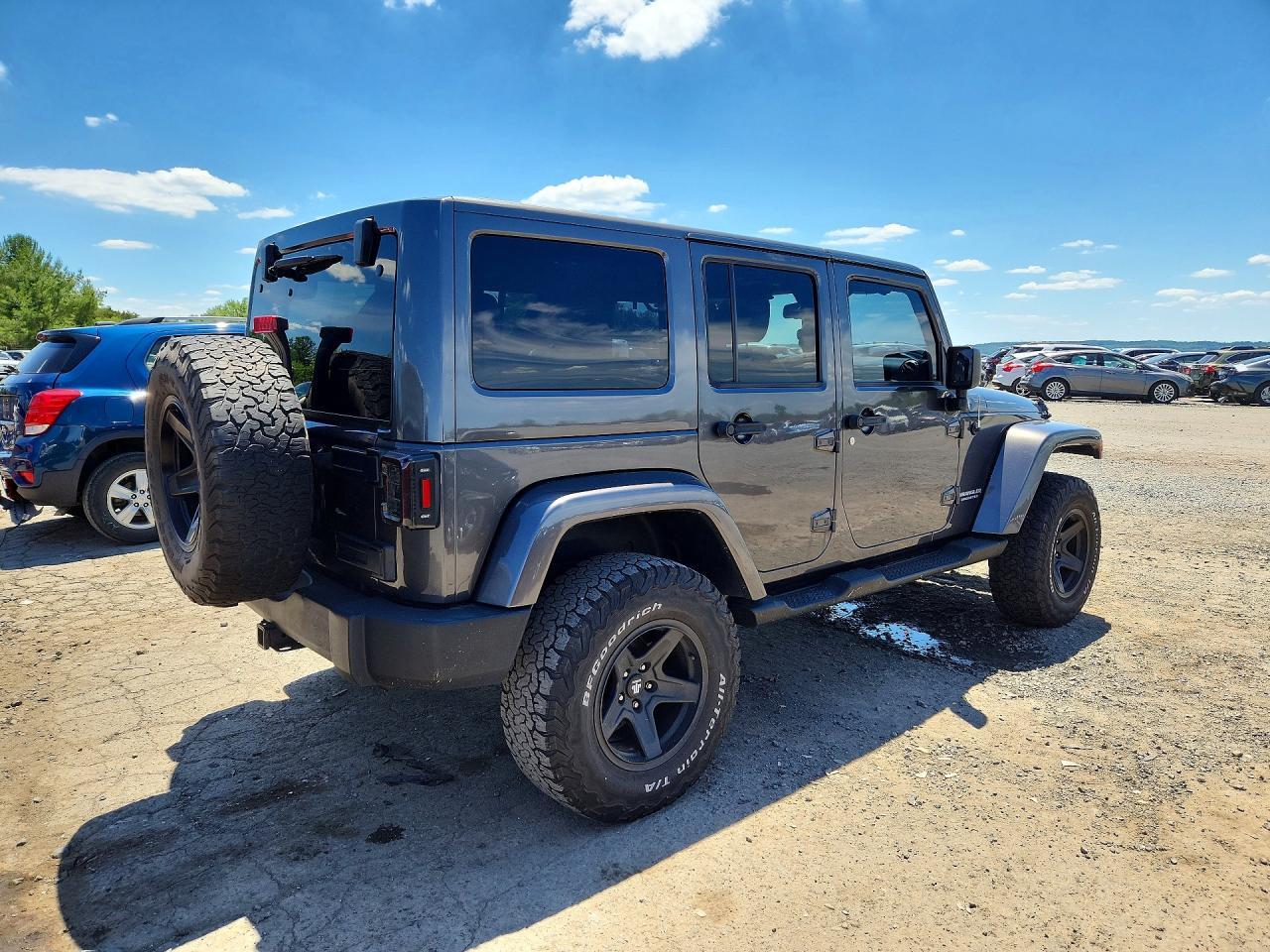 2014 Jeep Wrangler Unlimited Sahara - Фото 3