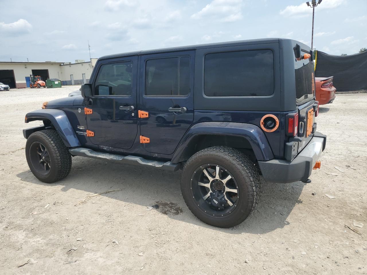 2013 Jeep Wrangler Unlimited Sahara - Фото 2