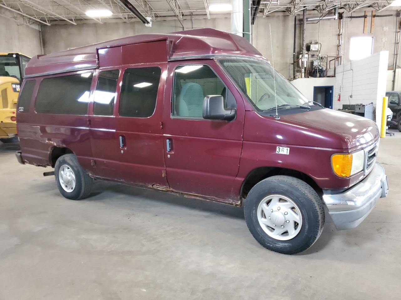 2004 Ford Econoline E350 Super Duty Wagon - Фото 4