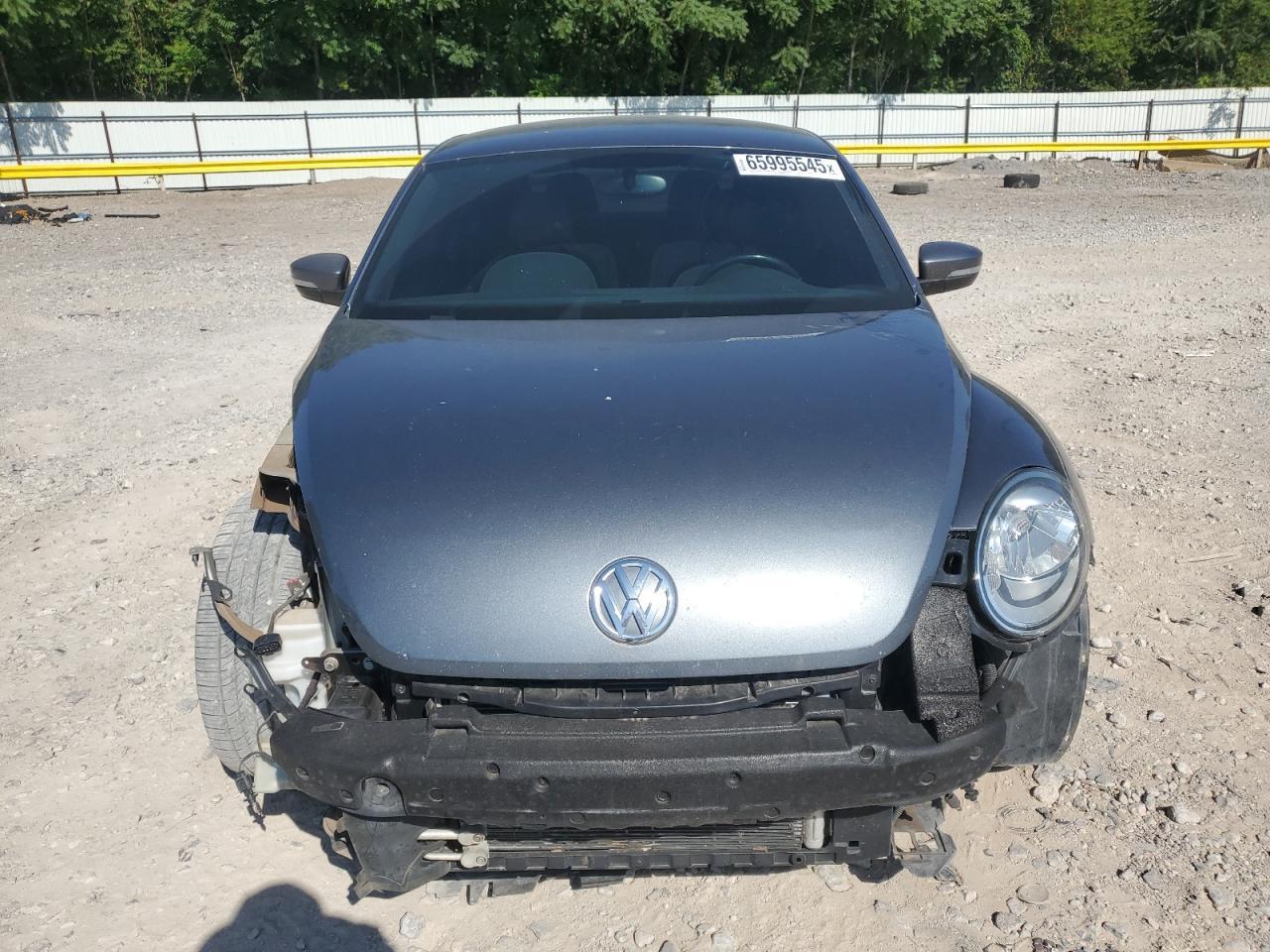 2016 Volkswagen Beetle 1.8T - Фото 5