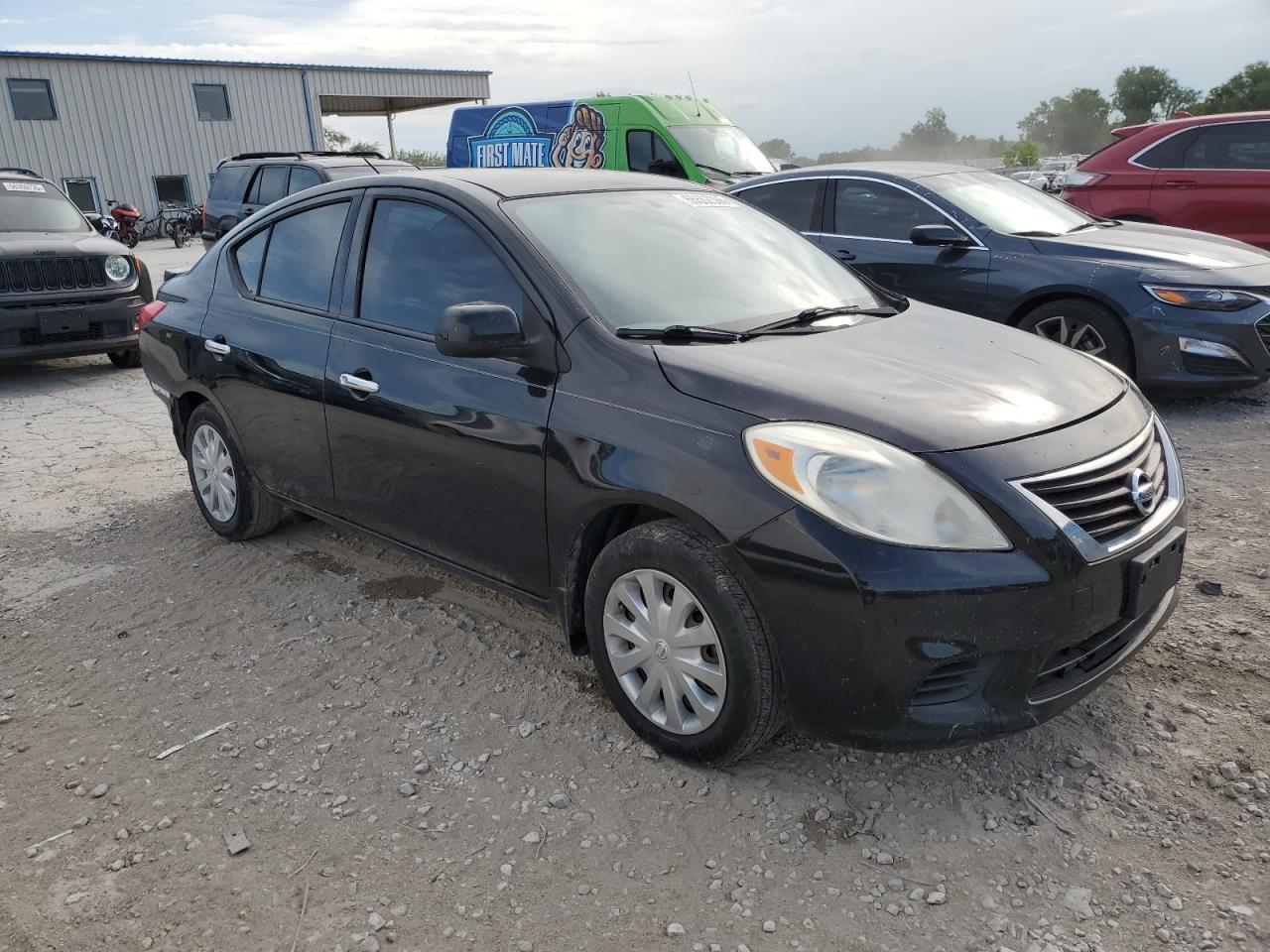2014 Nissan Versa S - Фото 4