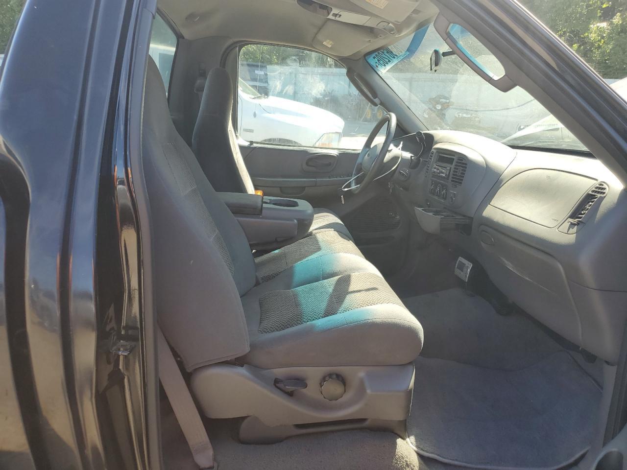 2002 Ford F150 - Фото 7