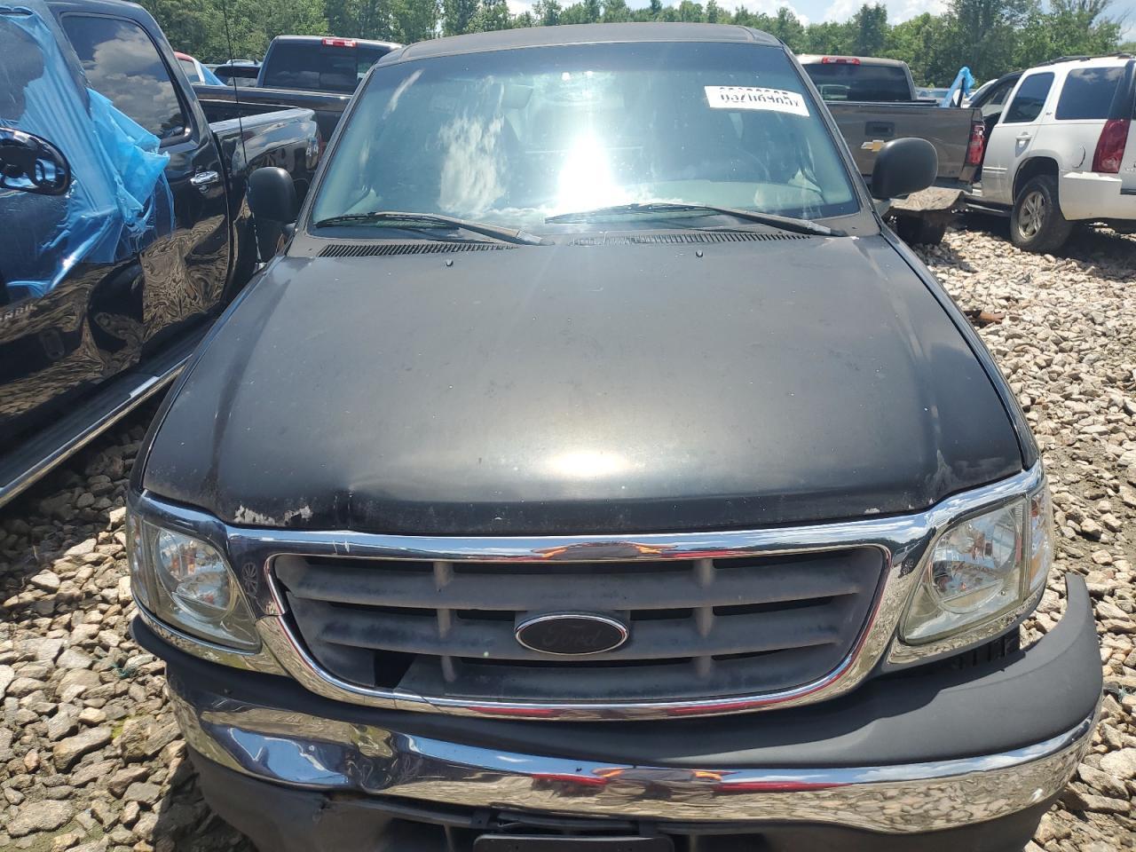 2003 Ford F150 - Фото 5