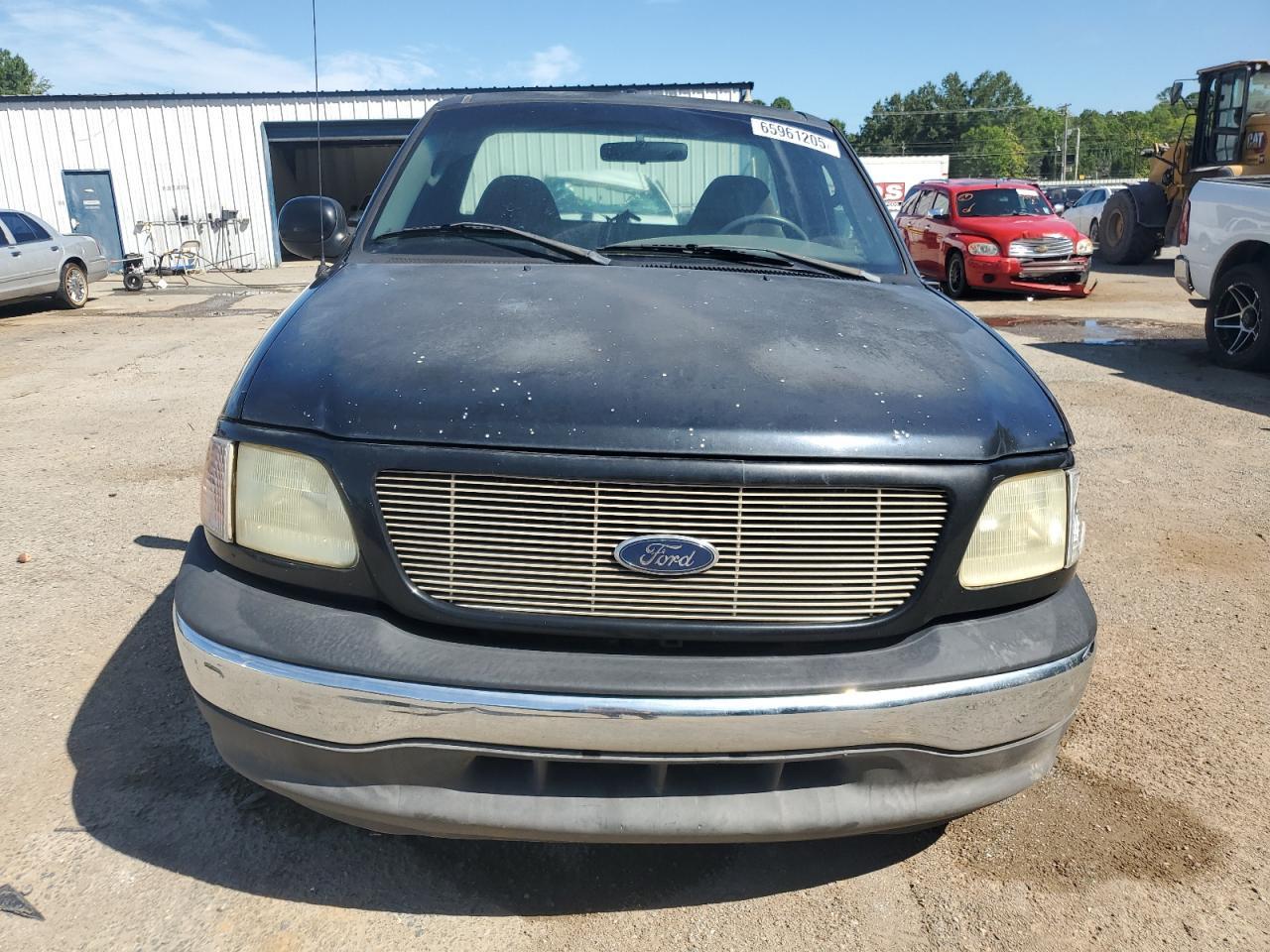 2002 Ford F150 - Фото 5