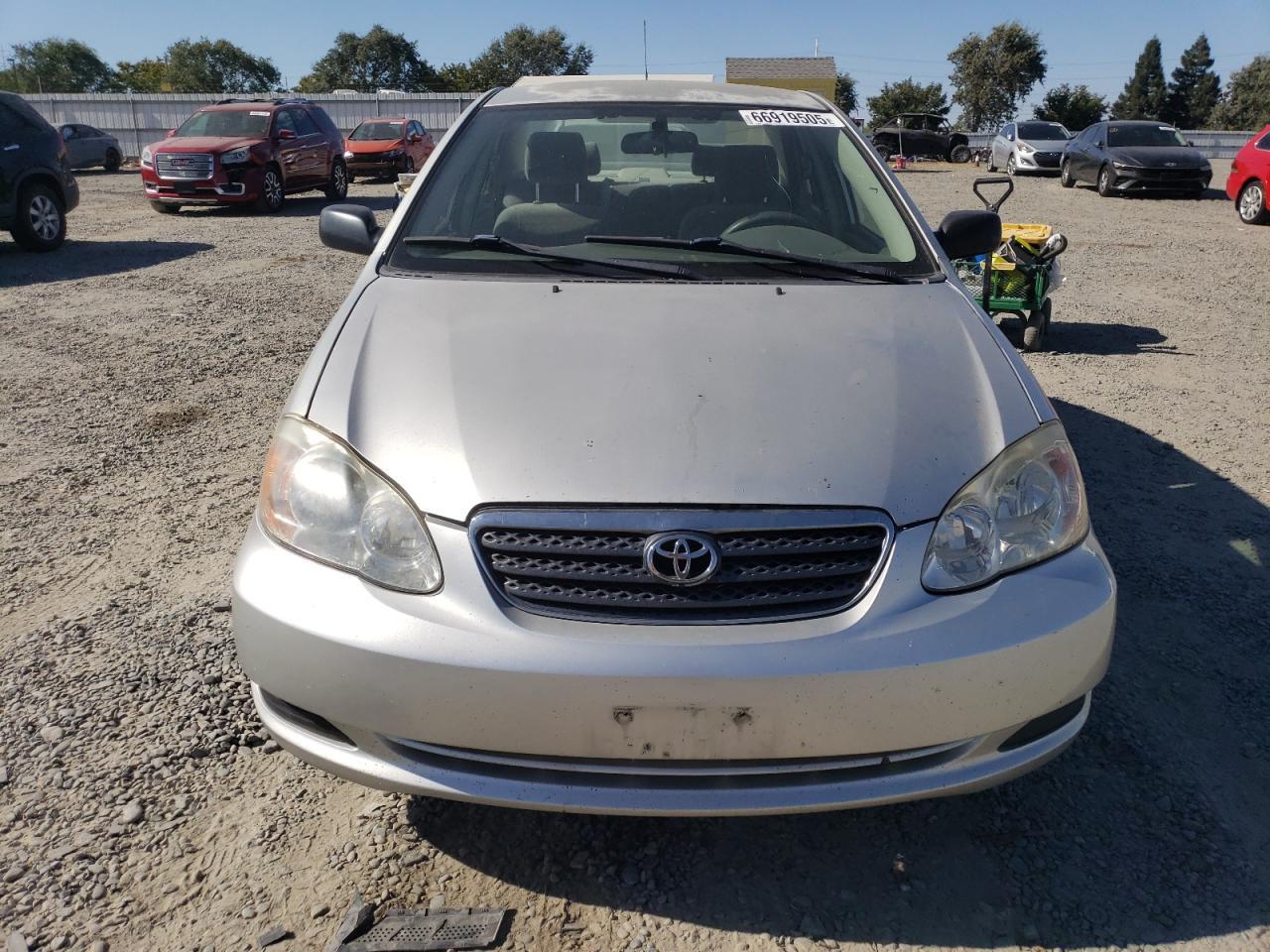 2004 Toyota Corolla Ce - Фото 5