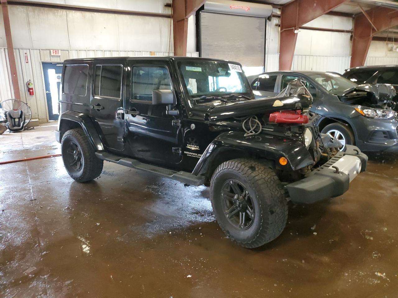 2012 Jeep Wrangler Unlimited Sahara - Фото 4