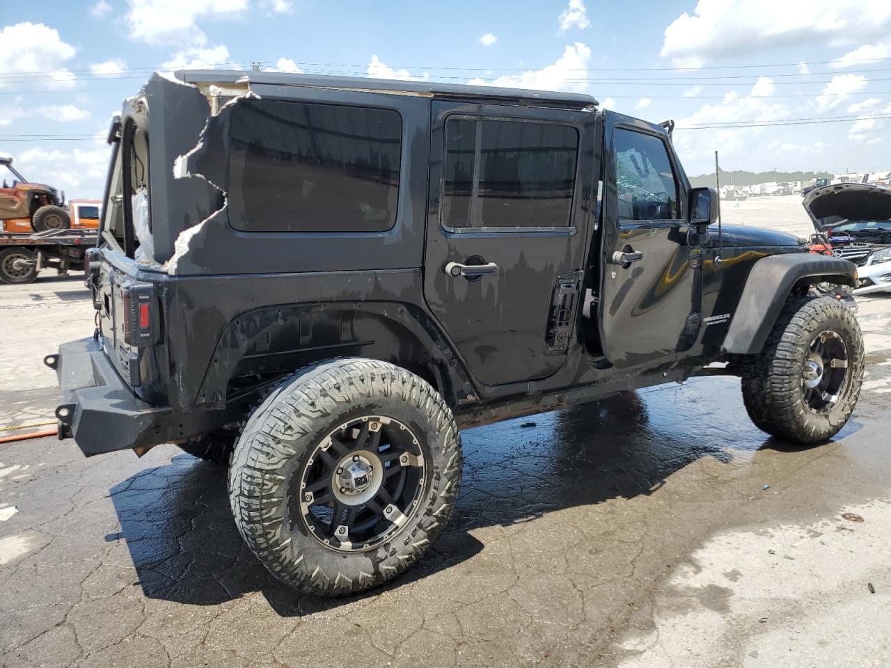 2011 Jeep Wrangler Unlimited Sahara - Фото 3