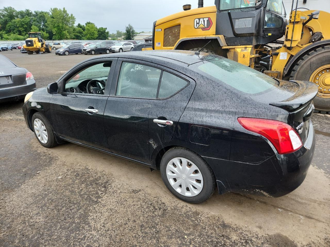 2014 Nissan Versa S - Фото 2