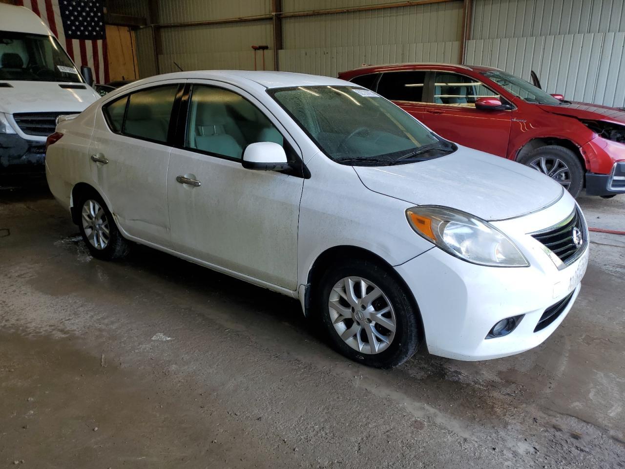 2014 Nissan Versa S - Фото 4