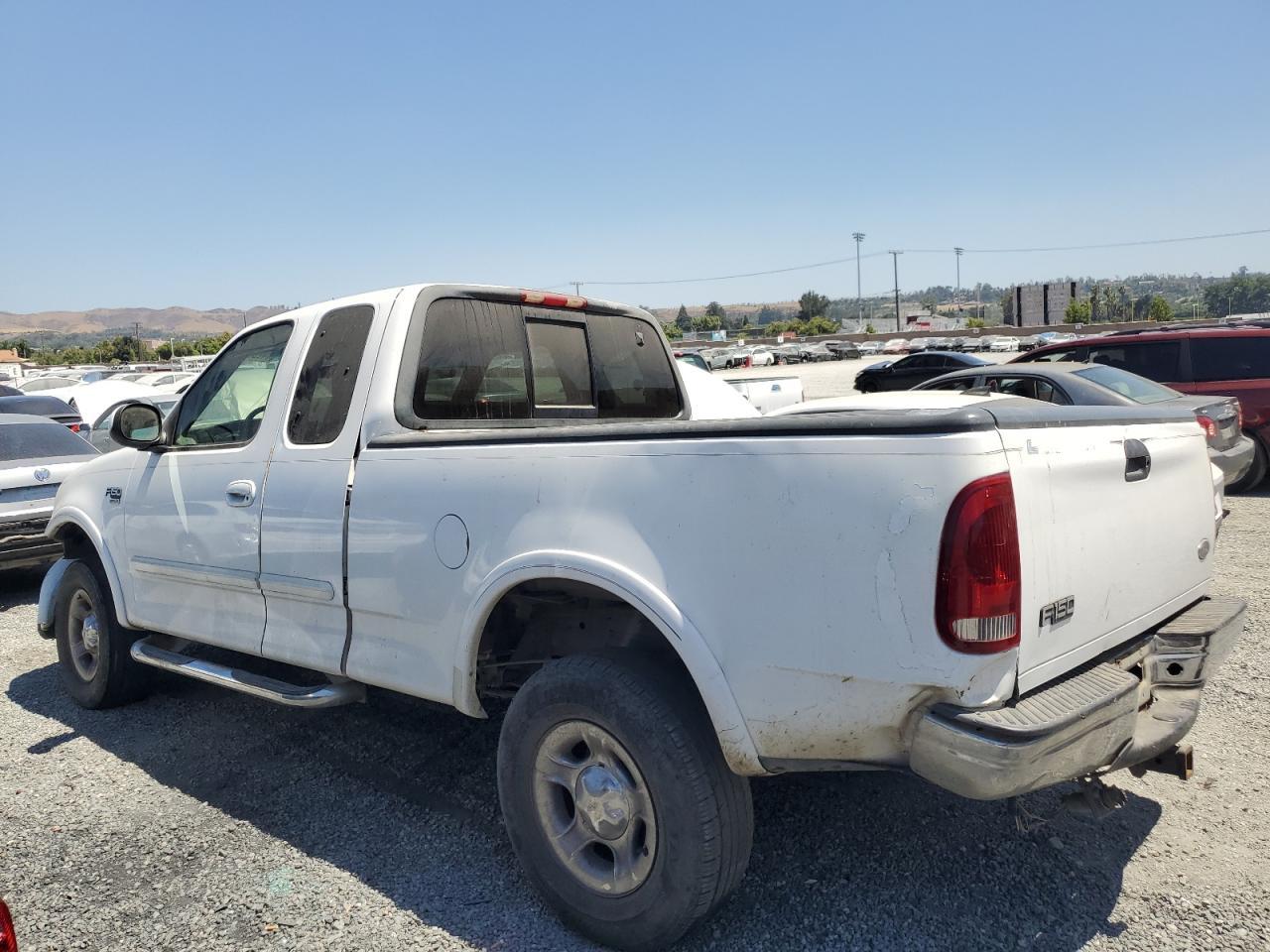 1999 Ford F150 - Фото 2