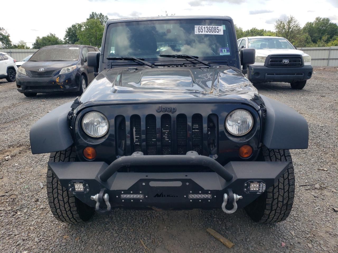 2013 Jeep Wrangler Unlimited Sahara - Фото 5