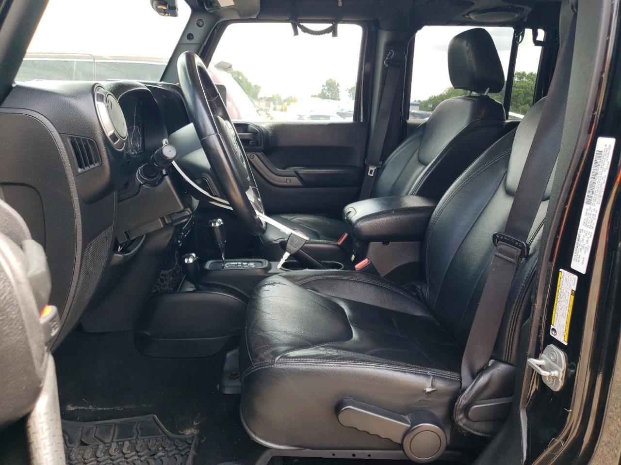 2013 Jeep Wrangler Unlimited Sahara - Фото 7