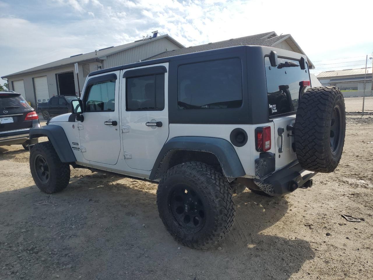 2014 Jeep Wrangler Unlimited Sport - Фото 2