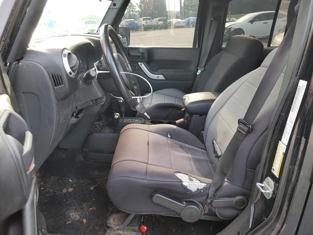 2012 Jeep Wrangler Unlimited Sahara - Фото 7