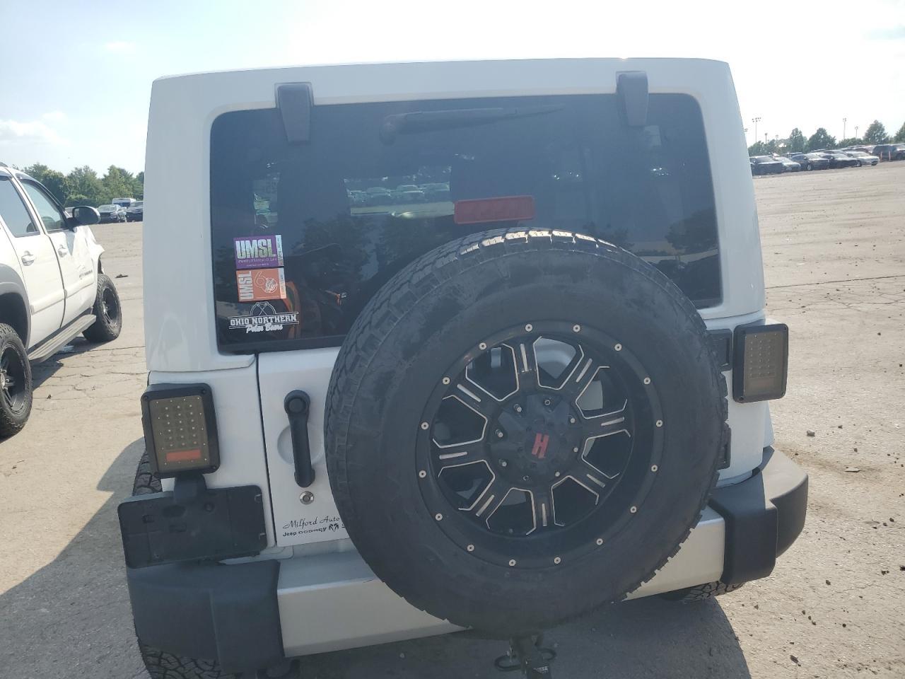 2012 Jeep Wrangler Unlimited Sahara - Фото 6