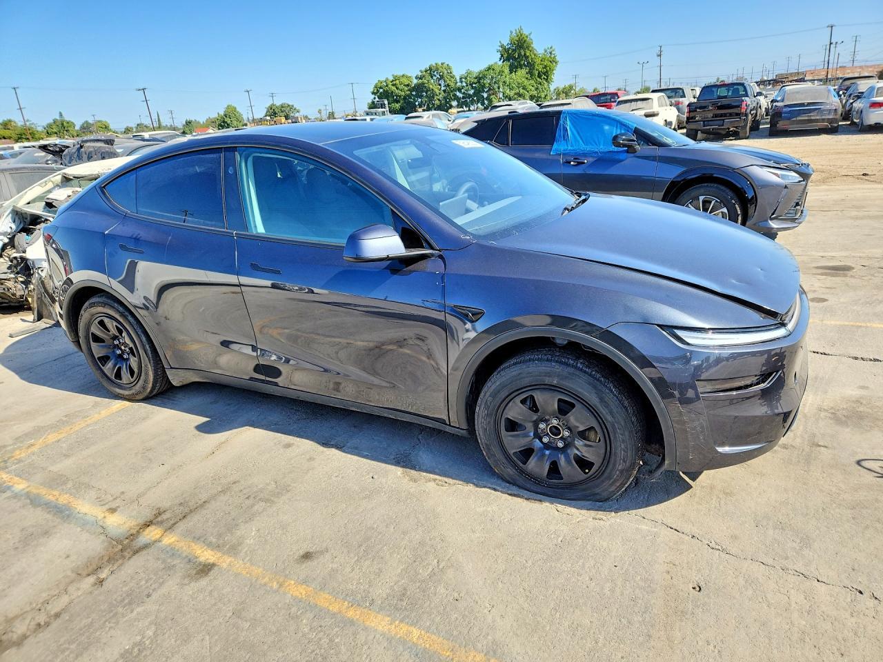 2026 Tesla Model Y - Фото 4