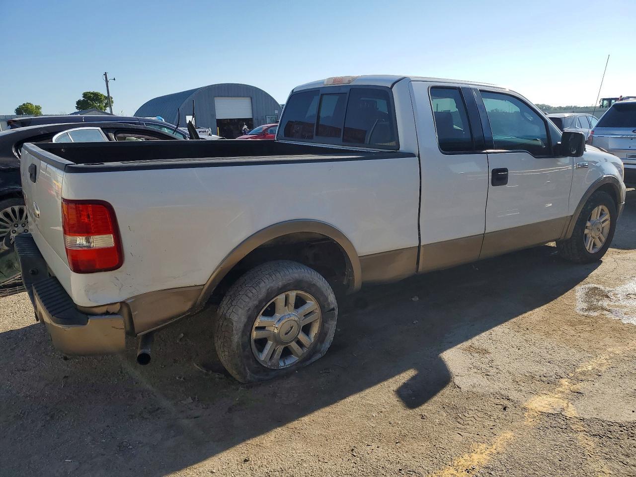 2004 Ford F150 - Фото 3