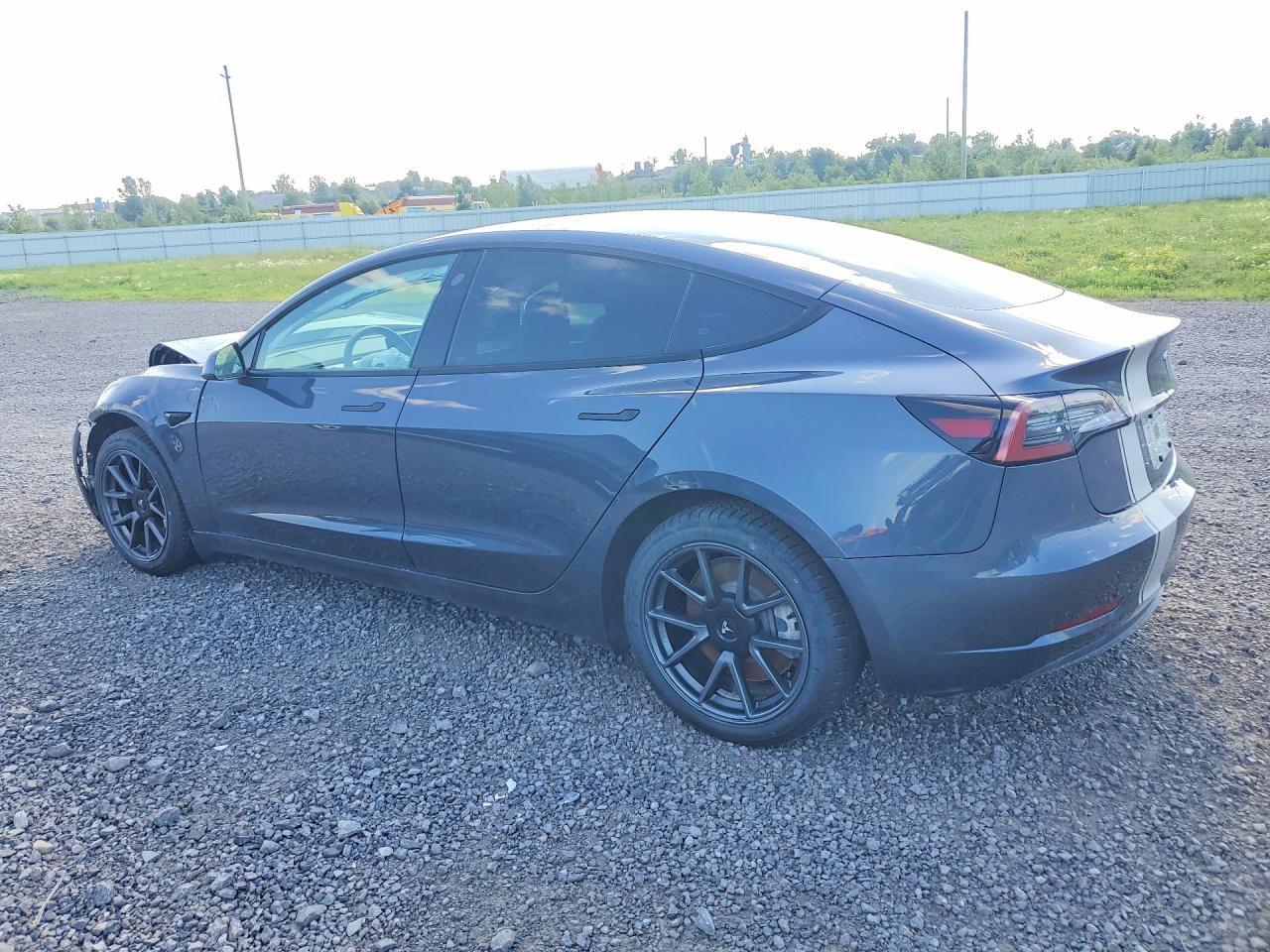 2023 Tesla Model 3 - Фото 2