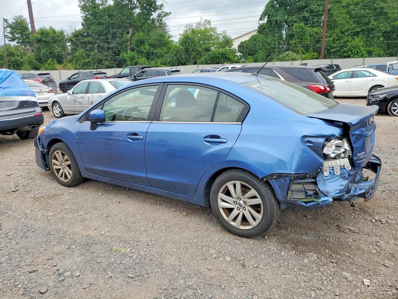 2016 Subaru Impreza Premium - Фото 2