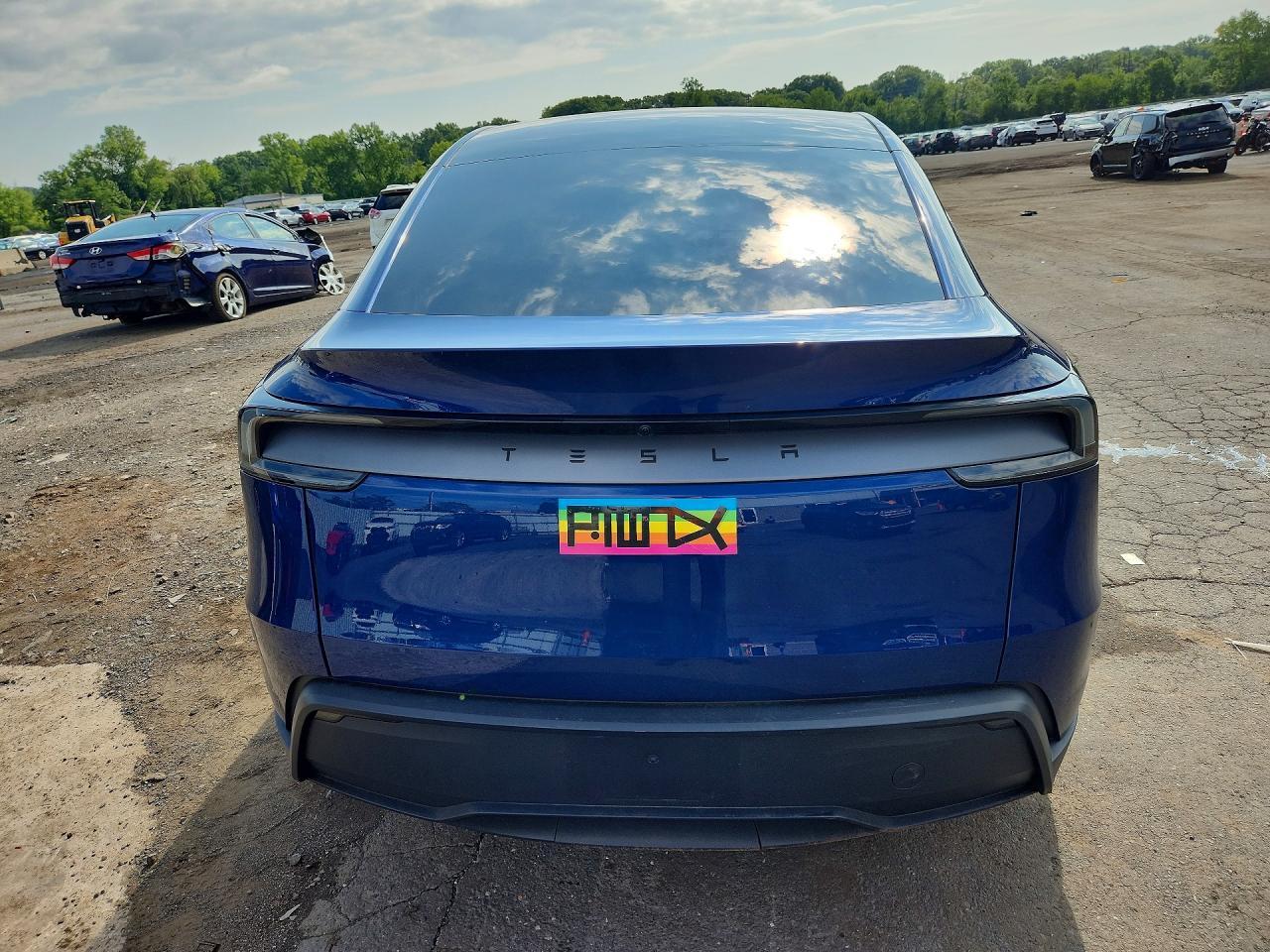 2026 Tesla Model Y - Фото 6