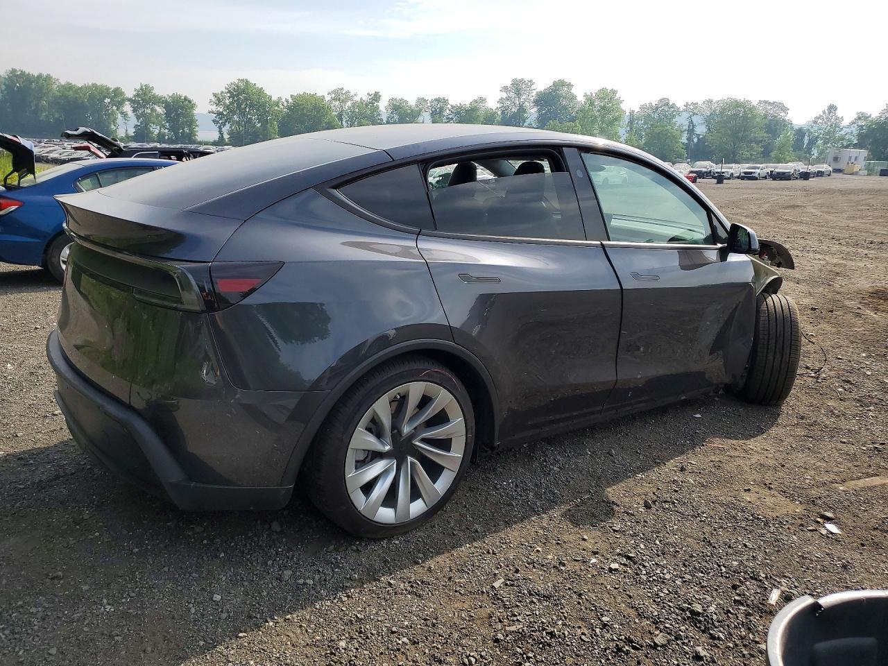 2026 Tesla Model Y - Фото 3
