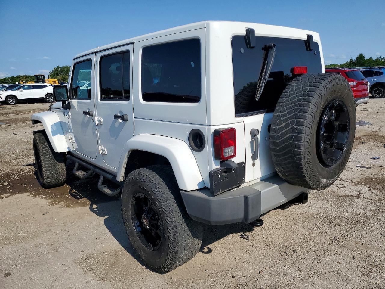 2014 Jeep Wrangler Unlimited Sahara - Фото 2