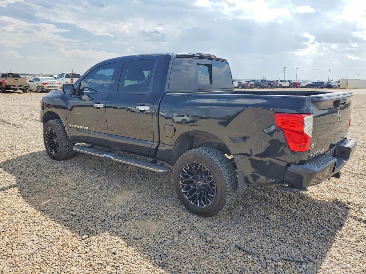 2019 Nissan Titan Sv - Фото 2