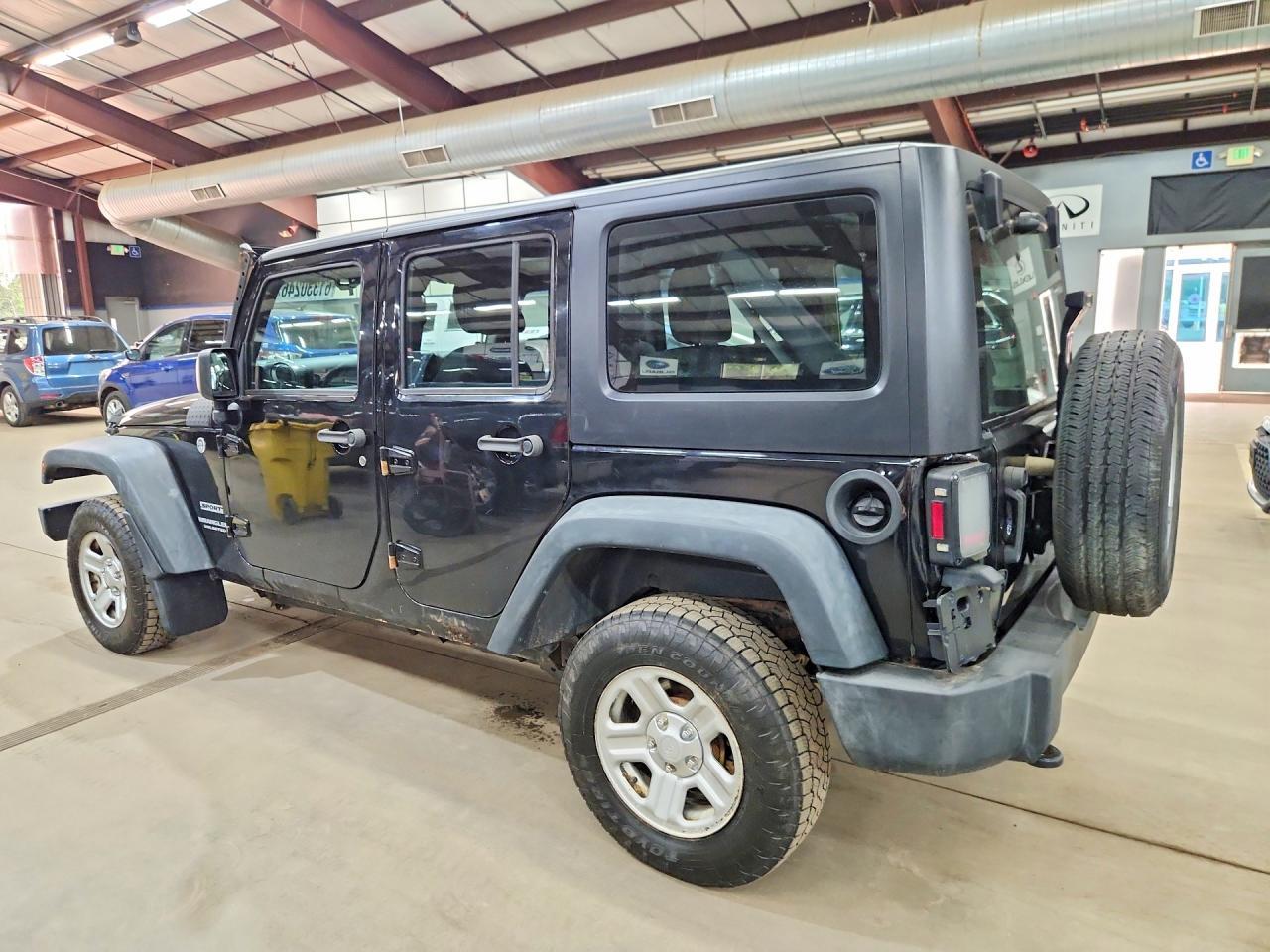 2016 Jeep Wrangler Unlimited Sport - Фото 2