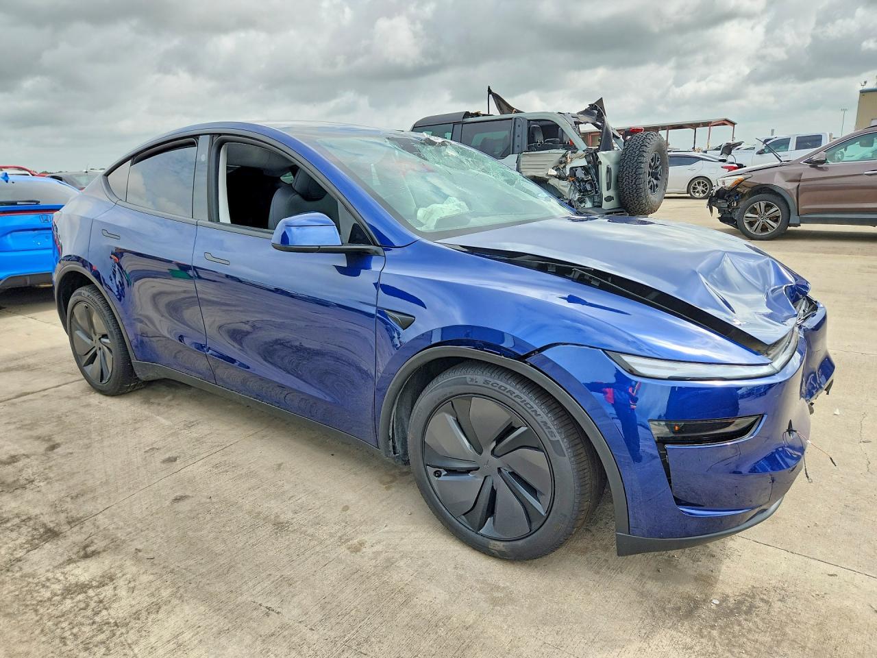 2026 Tesla Model Y - Фото 4