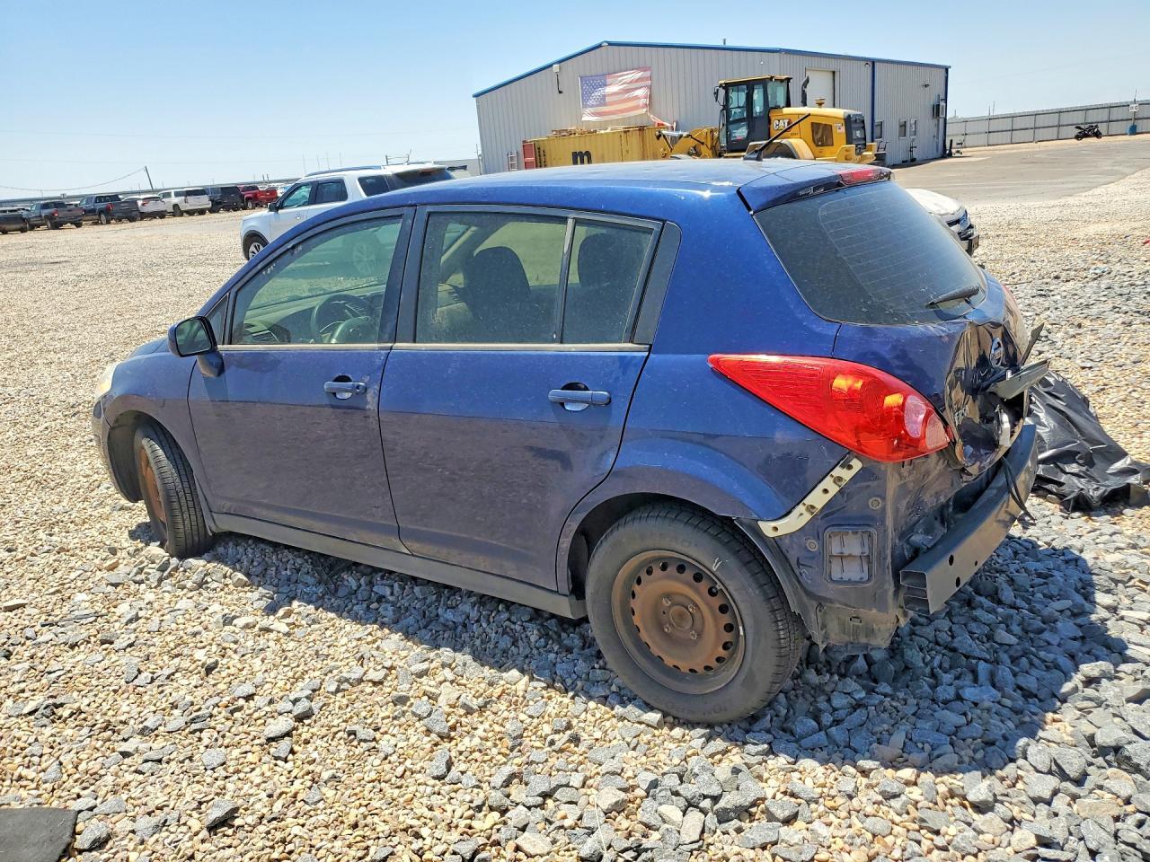 2012 Nissan Versa - Фото 2