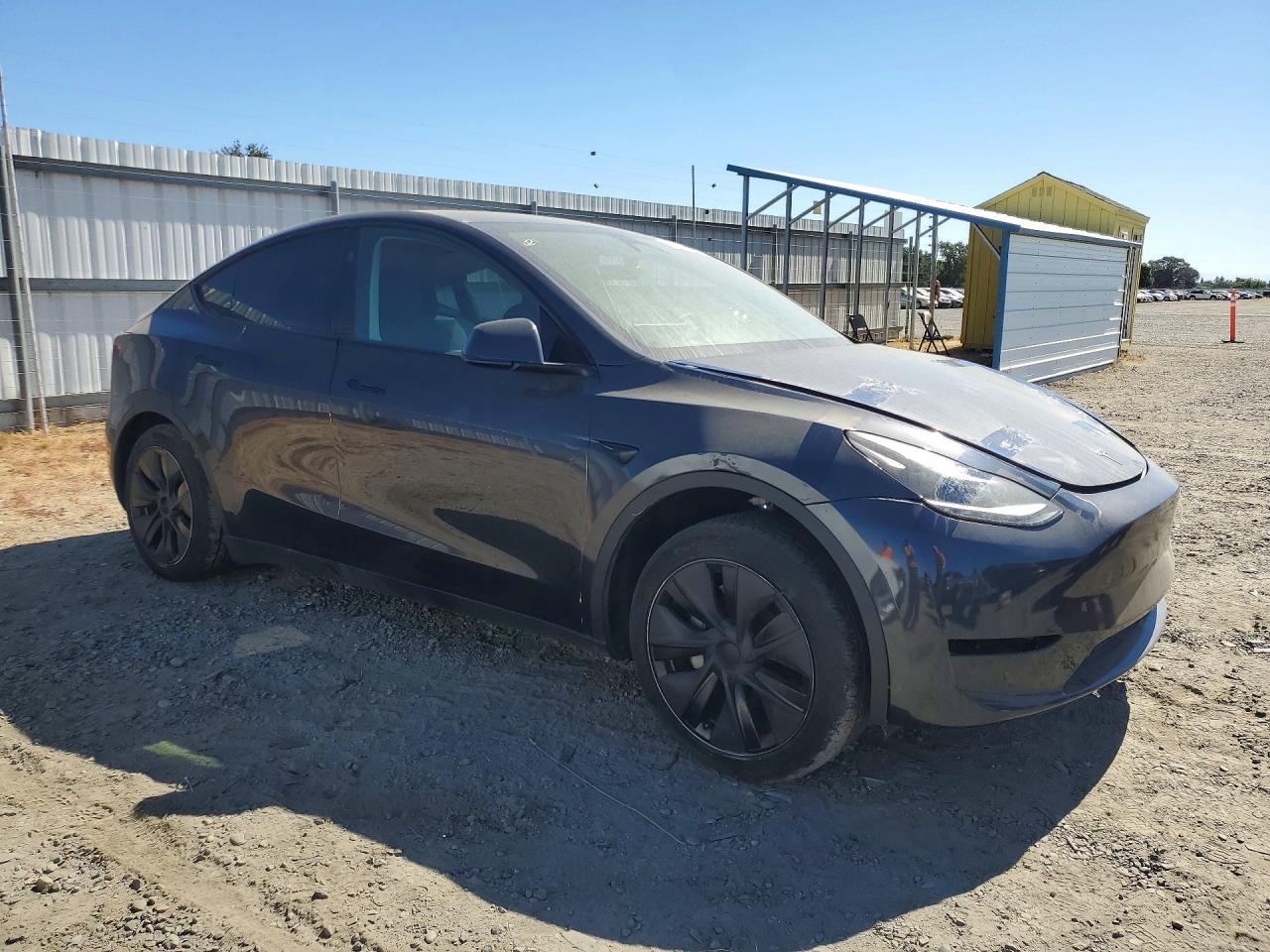2025 Tesla Model Y - Фото 4