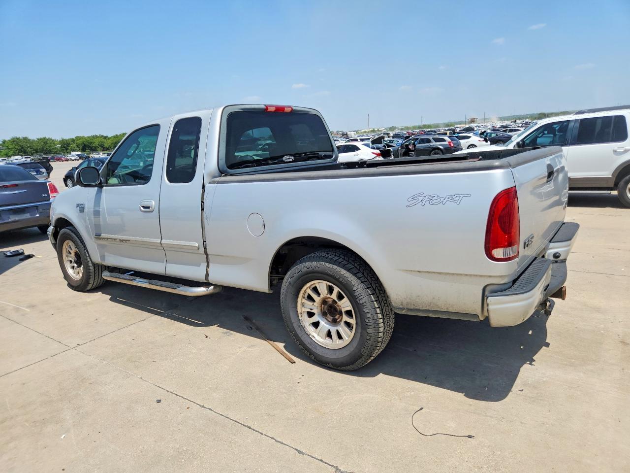 2003 Ford F150 - Фото 2