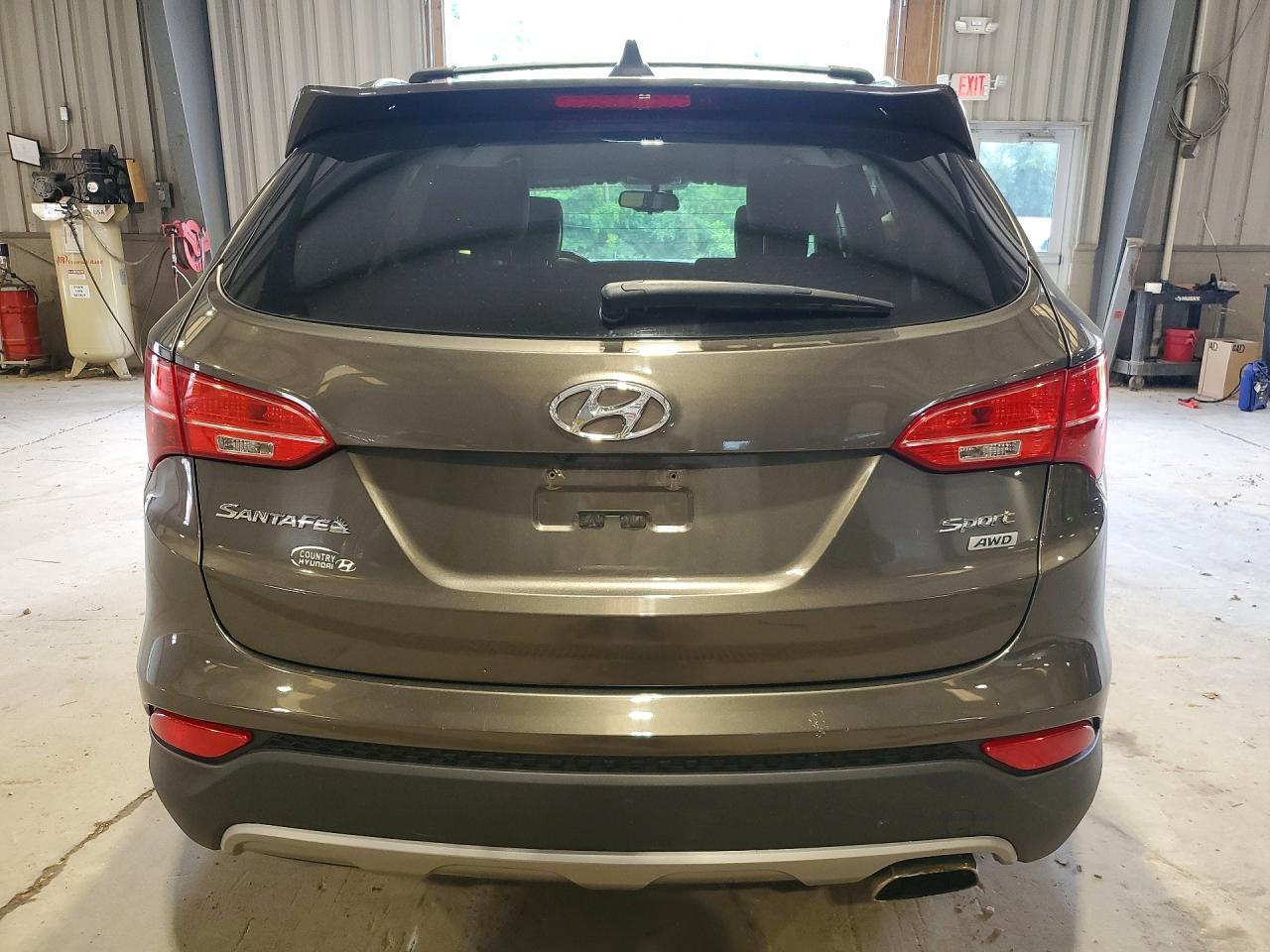 2014 Hyundai Santa Fe Sport 2.4L - Фото 6